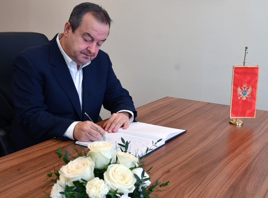 Dacic signs book of condolences at Montenegrin embassy